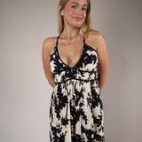 Shear Boutique ivory floral maxi dress spring 2026 women’s tiered maxi dress black trim feminine spring outfit