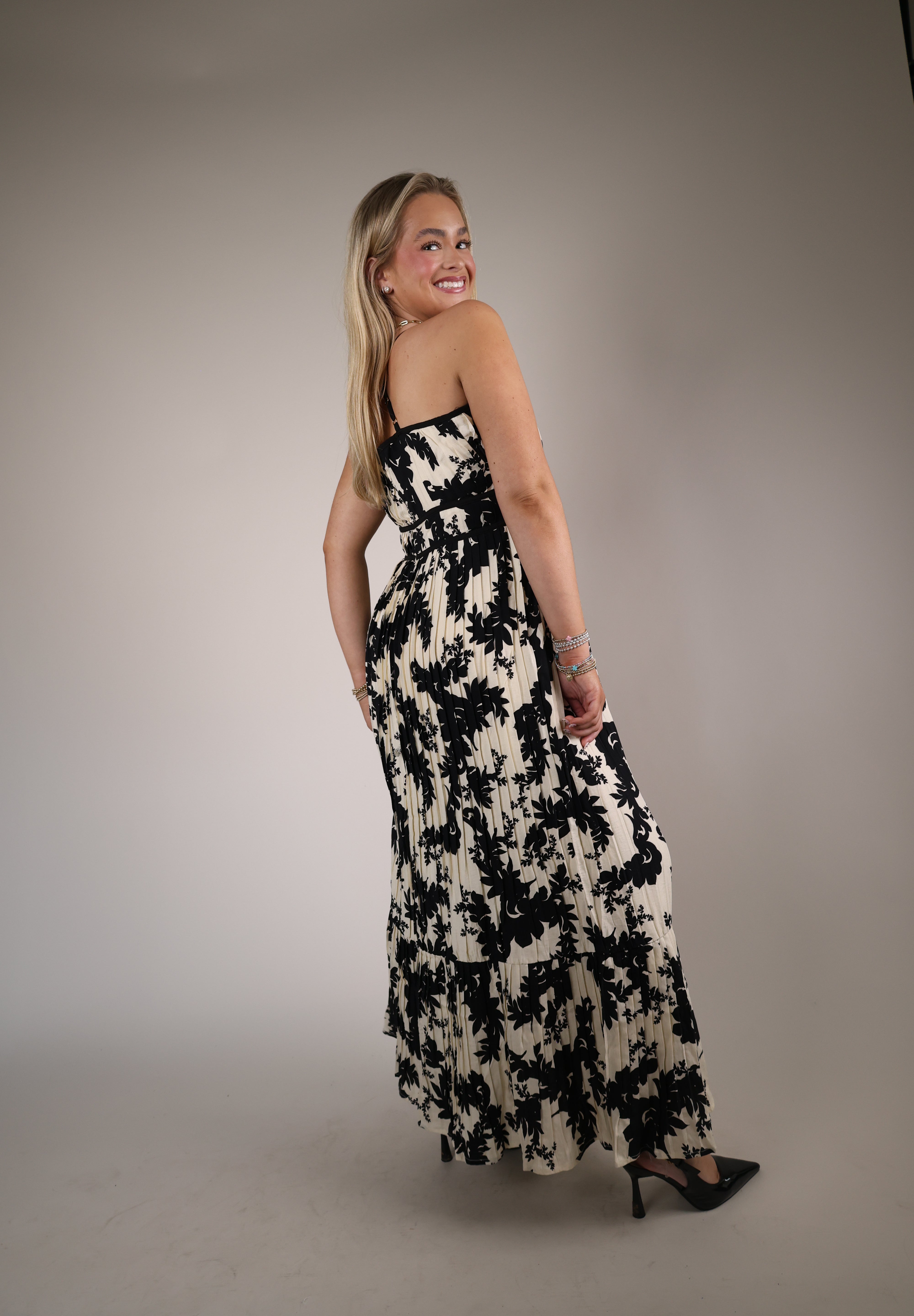 Shear Boutique ivory floral maxi dress spring 2026 women’s tiered maxi dress black trim feminine spring outfit