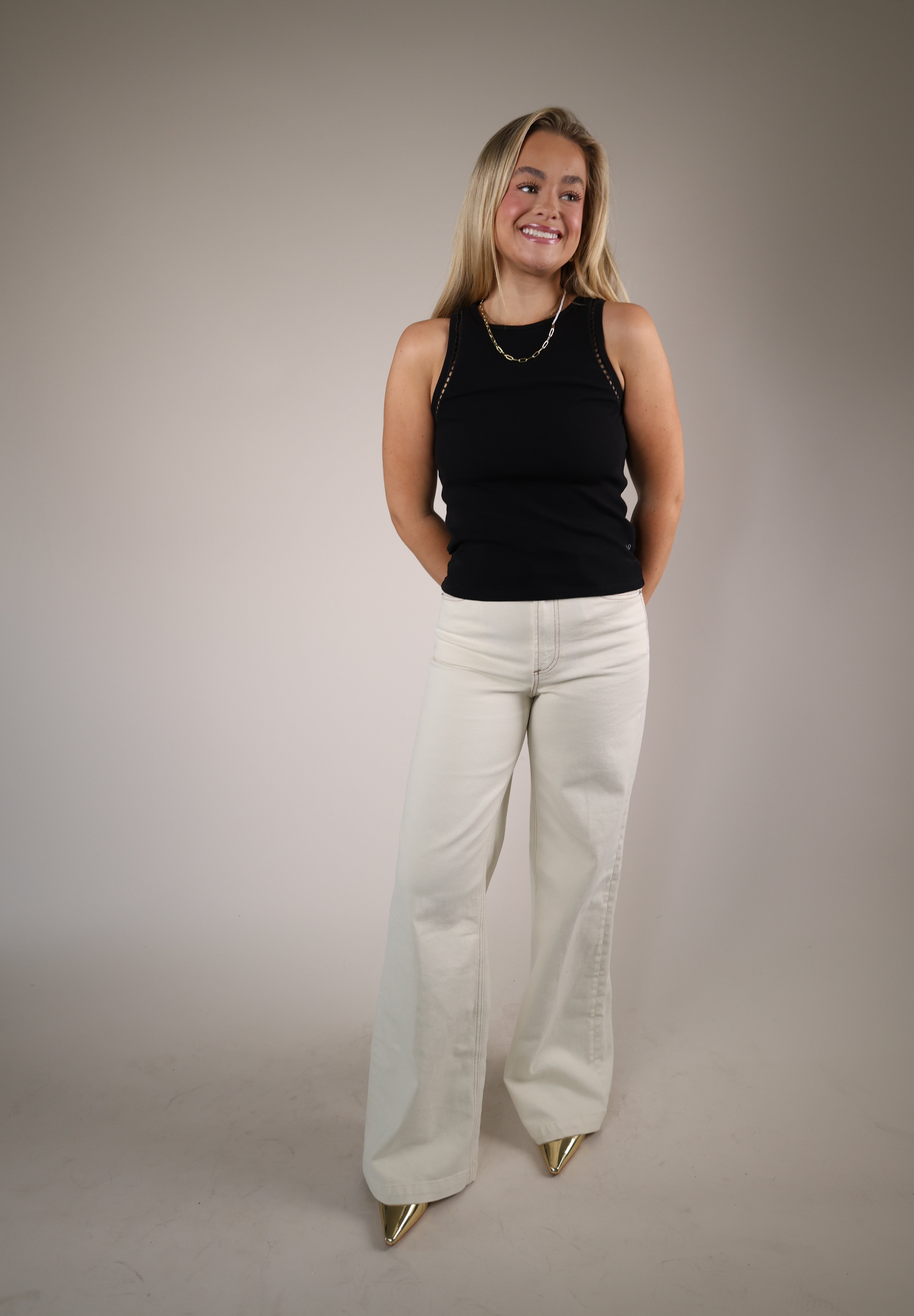 Shear Boutique spring 2026 black fitted tank top ribbed knit sleeveless everyday staple piece