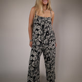 Shear Boutique Spring 2026 black floral jumpsuit relaxed fit women’s casual jumpsuit breezy everyday outfit