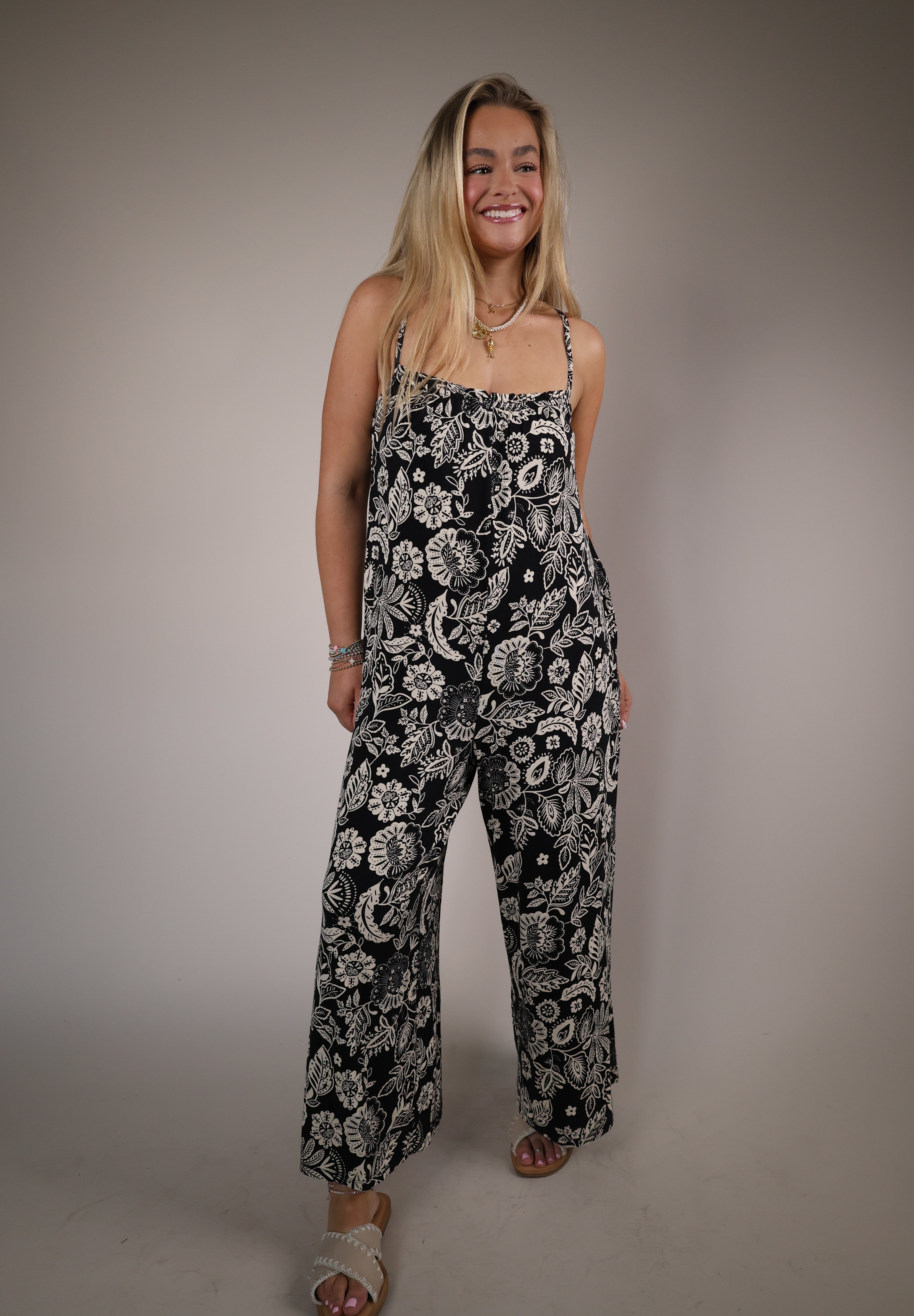 Shear Boutique Spring 2026 black floral jumpsuit relaxed fit women’s casual jumpsuit breezy everyday outfit