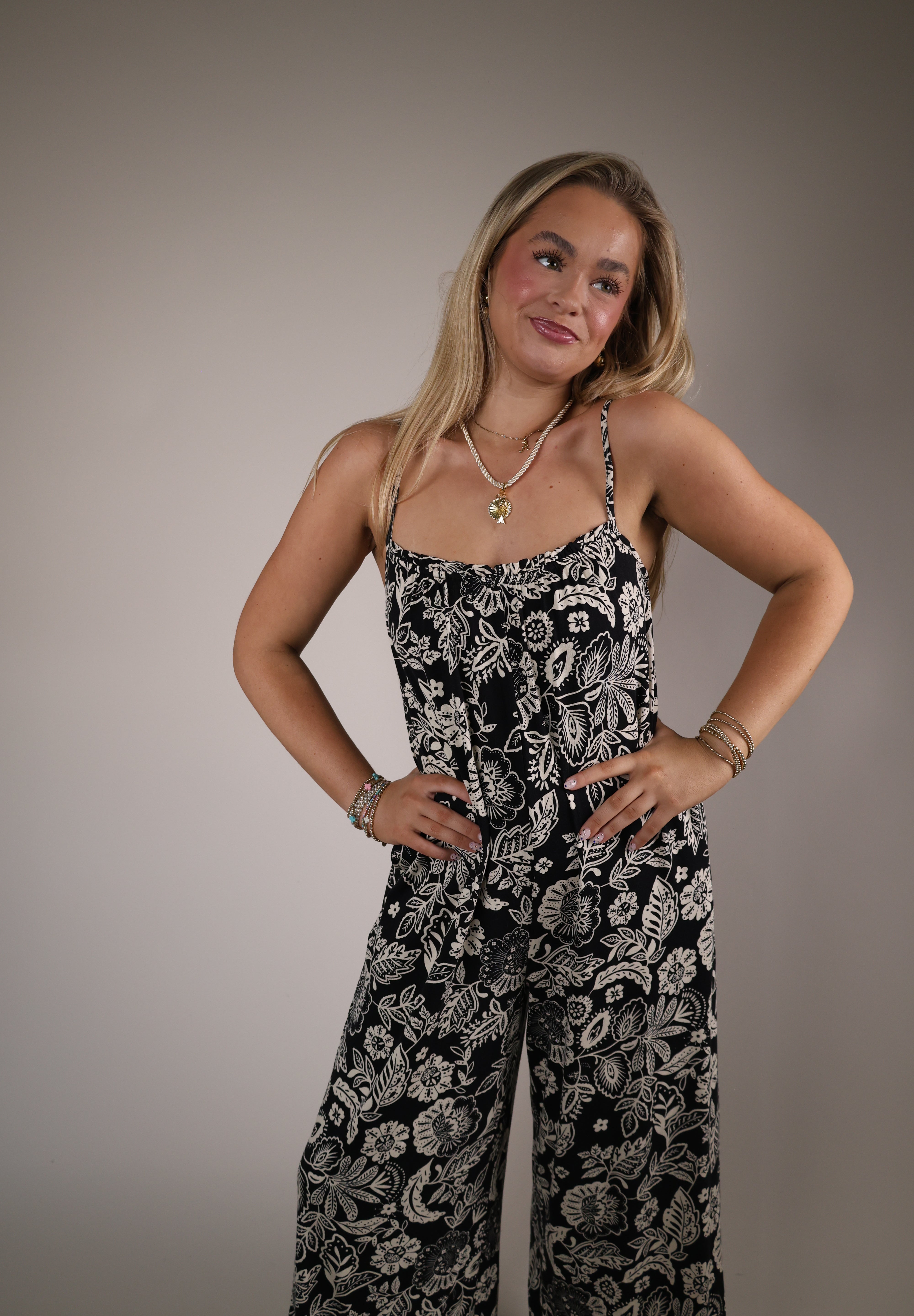 Shear Boutique black floral jumpsuit spring 2026 lightweight relaxed fit jumpsuit casual chic style