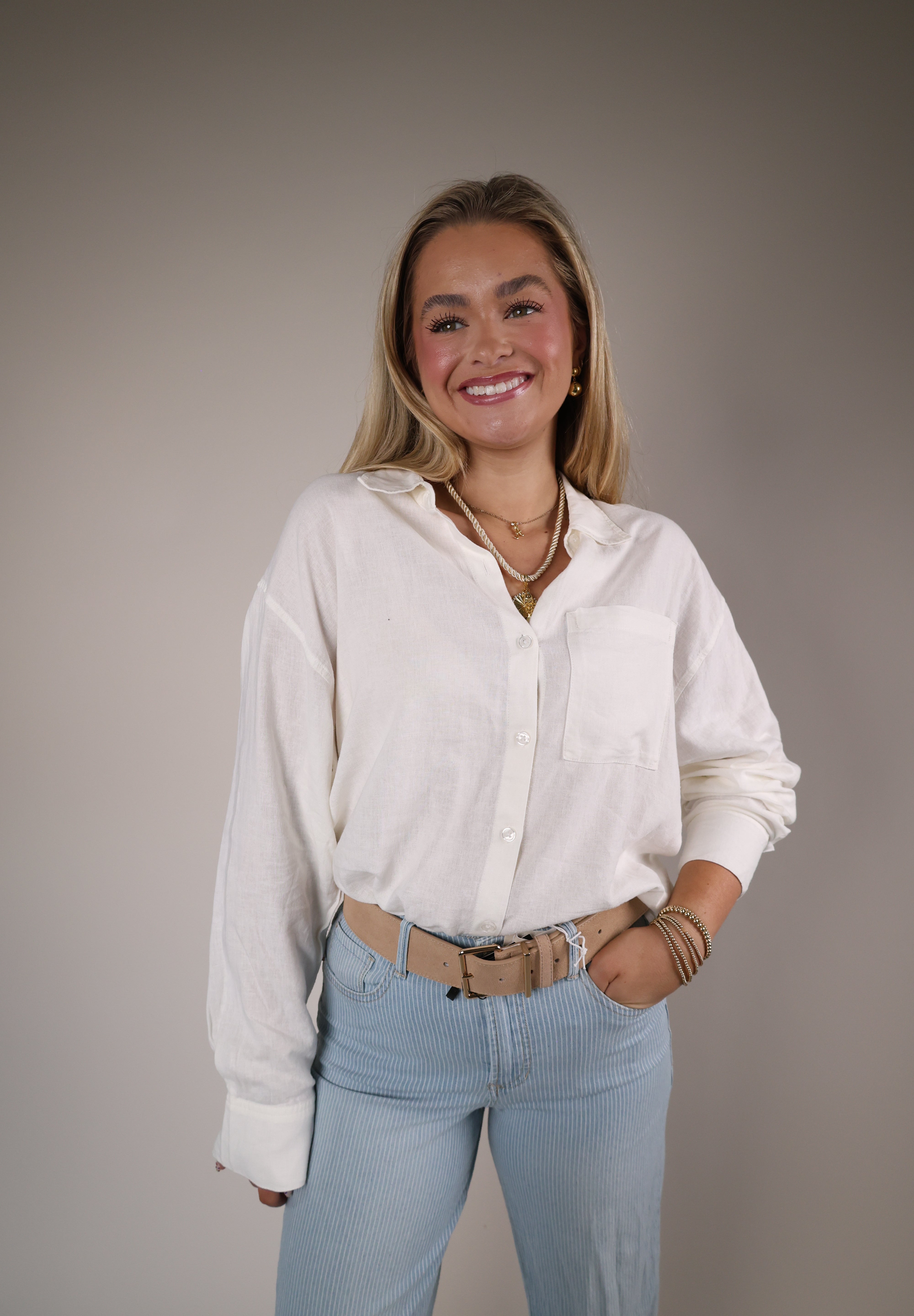 Women’s white button up shirt Shear Boutique spring collection 2026 lightweight drapey blouse casual chic outfit