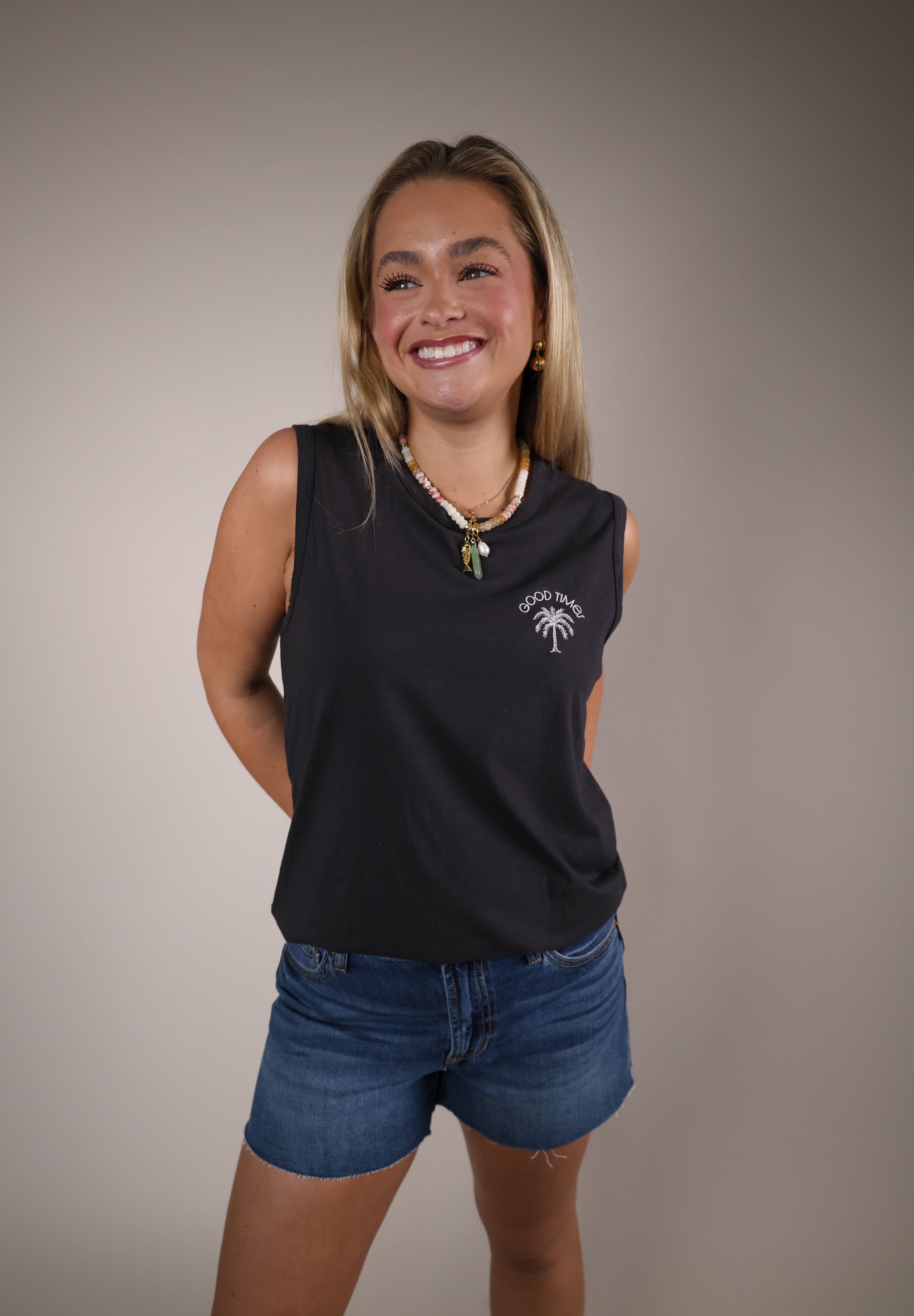 Shear Boutique Spring 2026 graphic muscle tank women’s relaxed sleeveless tee casual everyday outfit