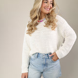 Soft white Pistola Katya sweater with breathable open-knit texture and slightly cropped fit.