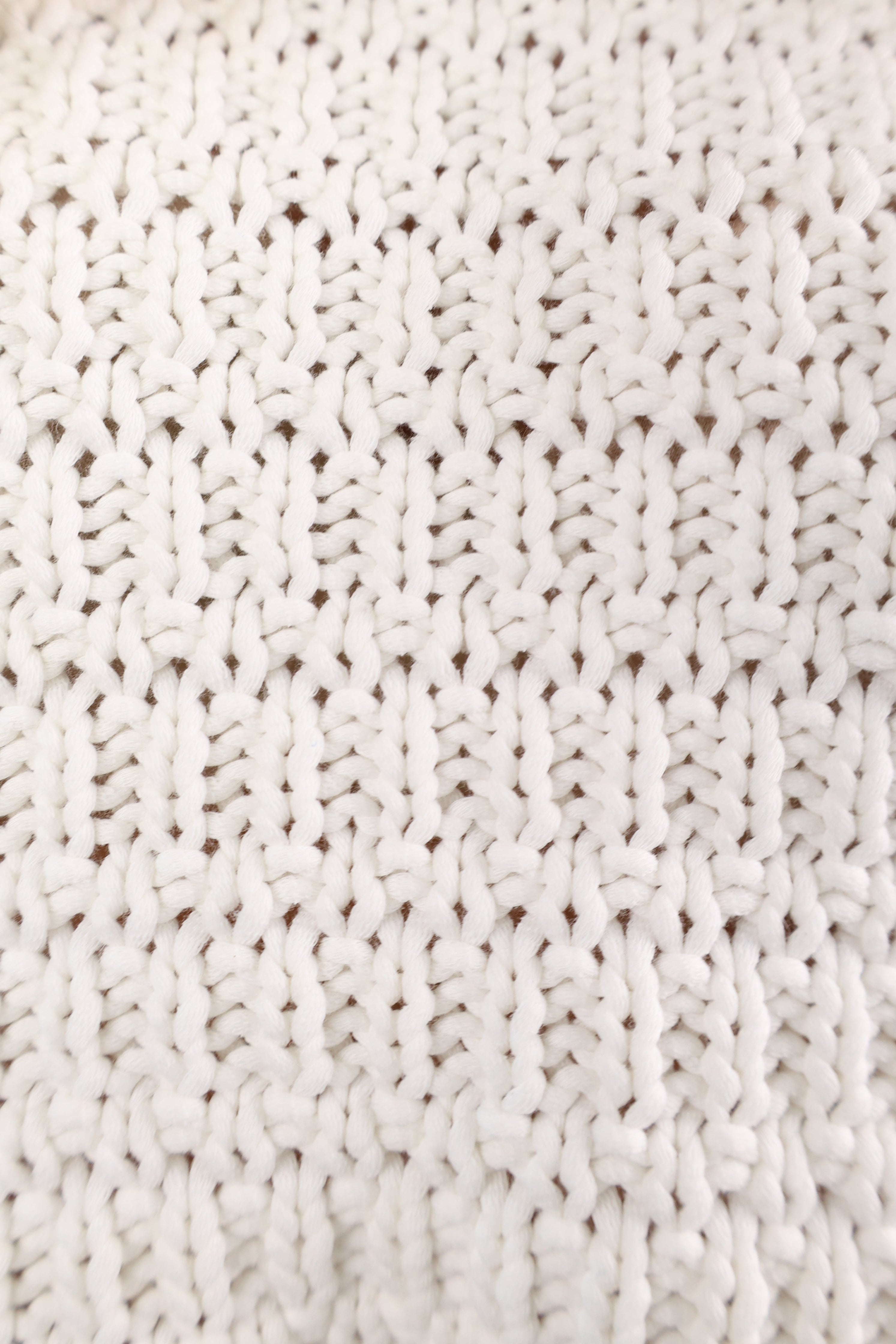 Minimalist Pistola Katya sweater in white textured knit with a comfortable relaxed fit.