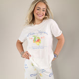Women’s Z Supply Club Tropics t-shirt featuring a cream cotton base and vibrant fruit-inspired graphic.