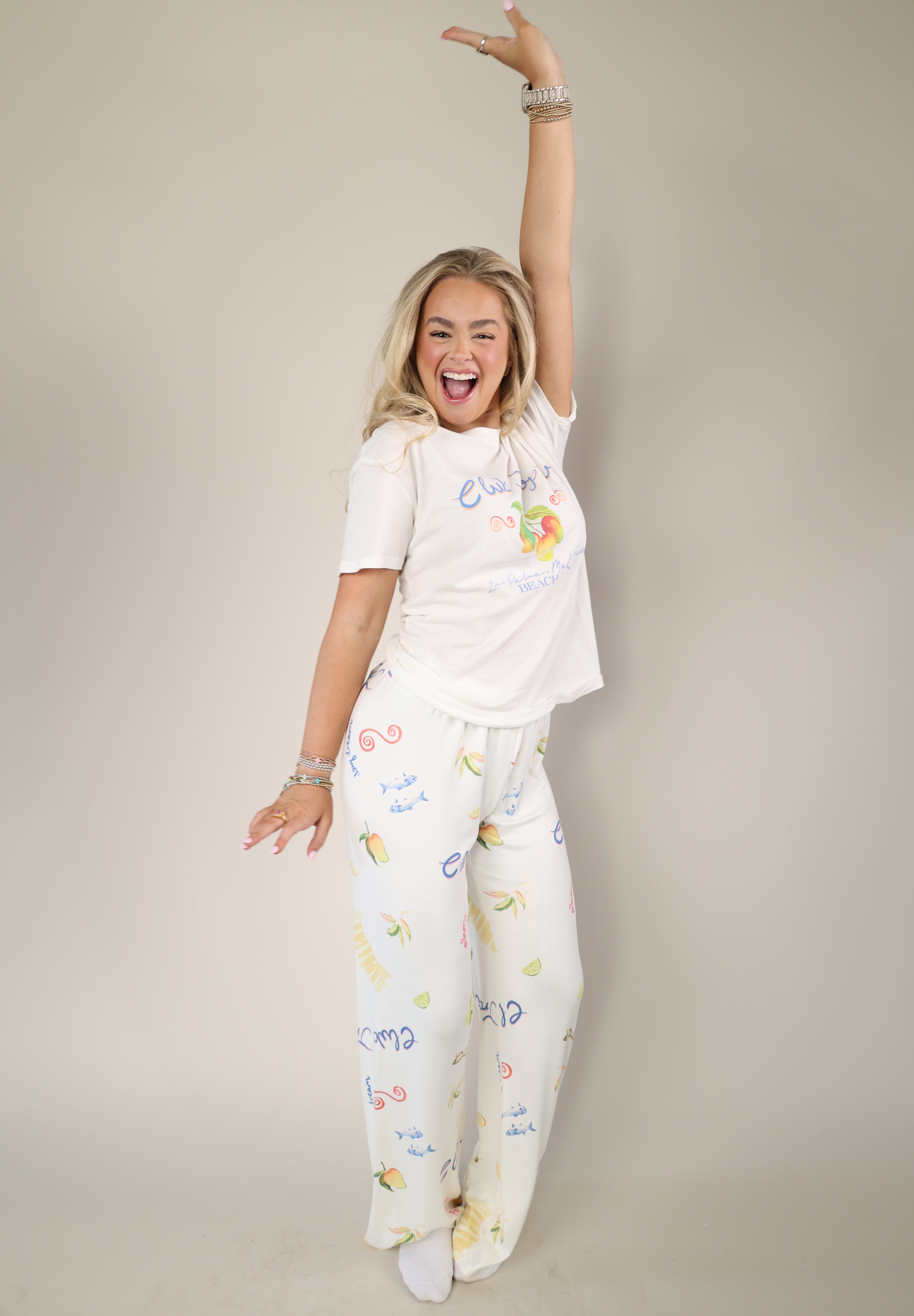 Z Supply Vintage Tropic wide-leg pants in soft ivory with colorful tropical illustrations and easy pull-on style.