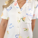 Z Supply Beach Days pajama top in soft ivory with illustrated beach motifs and chest pocket.