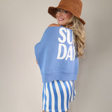 Casual Z Supply Sunday sweatshirt in blue with a comfortable oversized silhouette and graphic front.