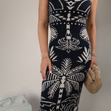 Z Supply Esperanza sleeveless midi dress in navy with cream palm print and flattering fitted shape.