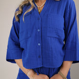 Relaxed Z Supply Helena shirt in bold blue with a button-front closure and airy textured fabric.