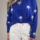 Z Supply Sienna Palm sweater in vibrant blue knit with tropical palm print and relaxed silhouette.
