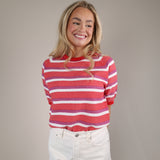 Casual Sundry stripe crewneck sweater in pink and white with a lightweight knit and relaxed silhouette.
