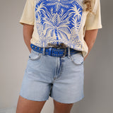 Women’s Z Supply Jonah denim shorts featuring a mid-rise waist, light wash finish, and frayed hem.