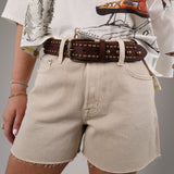 Minimalist beige Pistola Kennedy shorts featuring a high waist, relaxed fit, and frayed hemline.