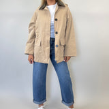 Camel Deluc Montecarlo jacket featuring faux leather trim with zip and button closure