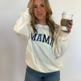Woman holding coffee cup and wearing the product