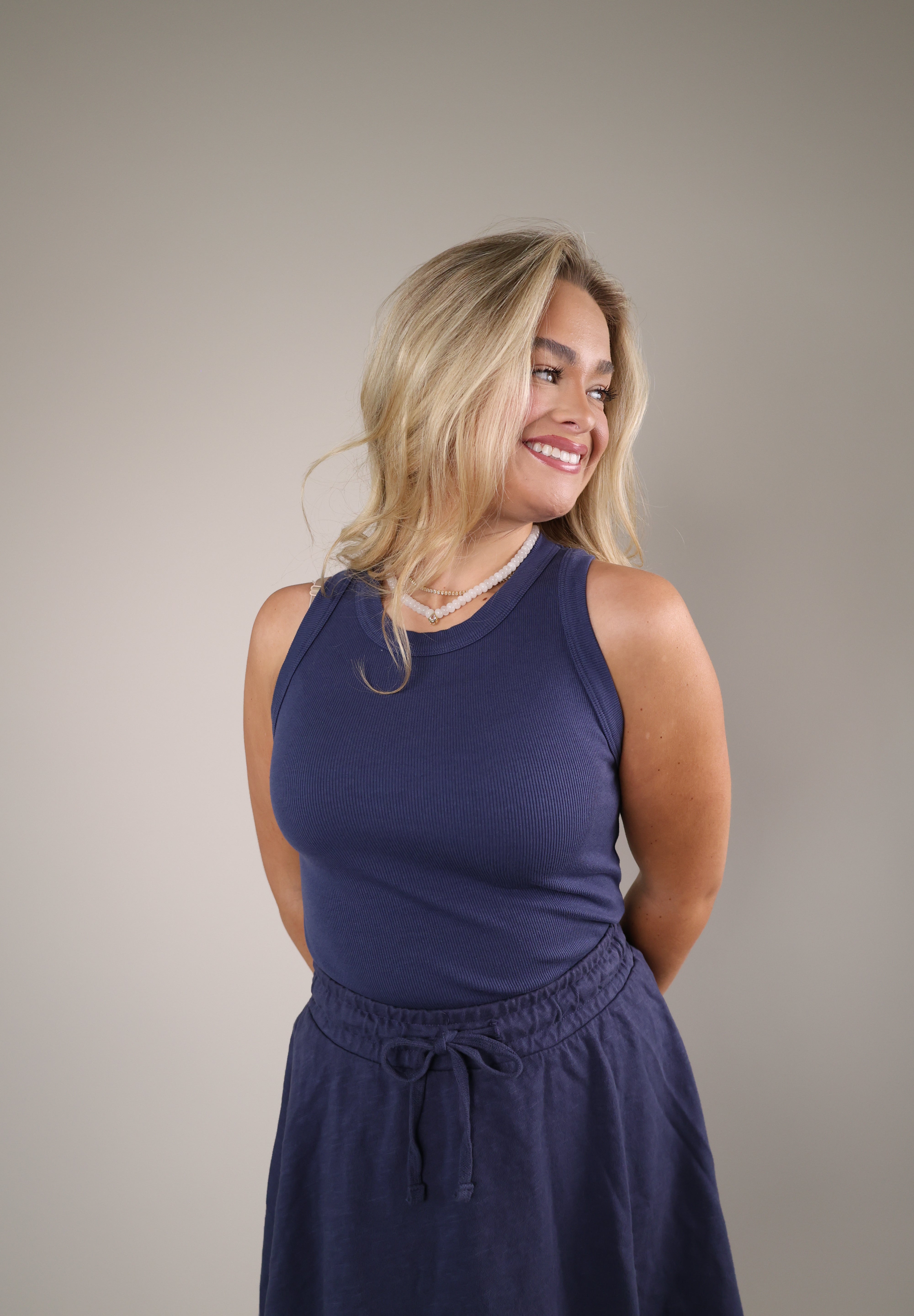 Shear Boutique fitted tank top spring 2026 high neckline sleeveless top black white navy basics