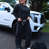 Women’s two-piece lounge set with cropped crewneck sweatshirt and relaxed pants