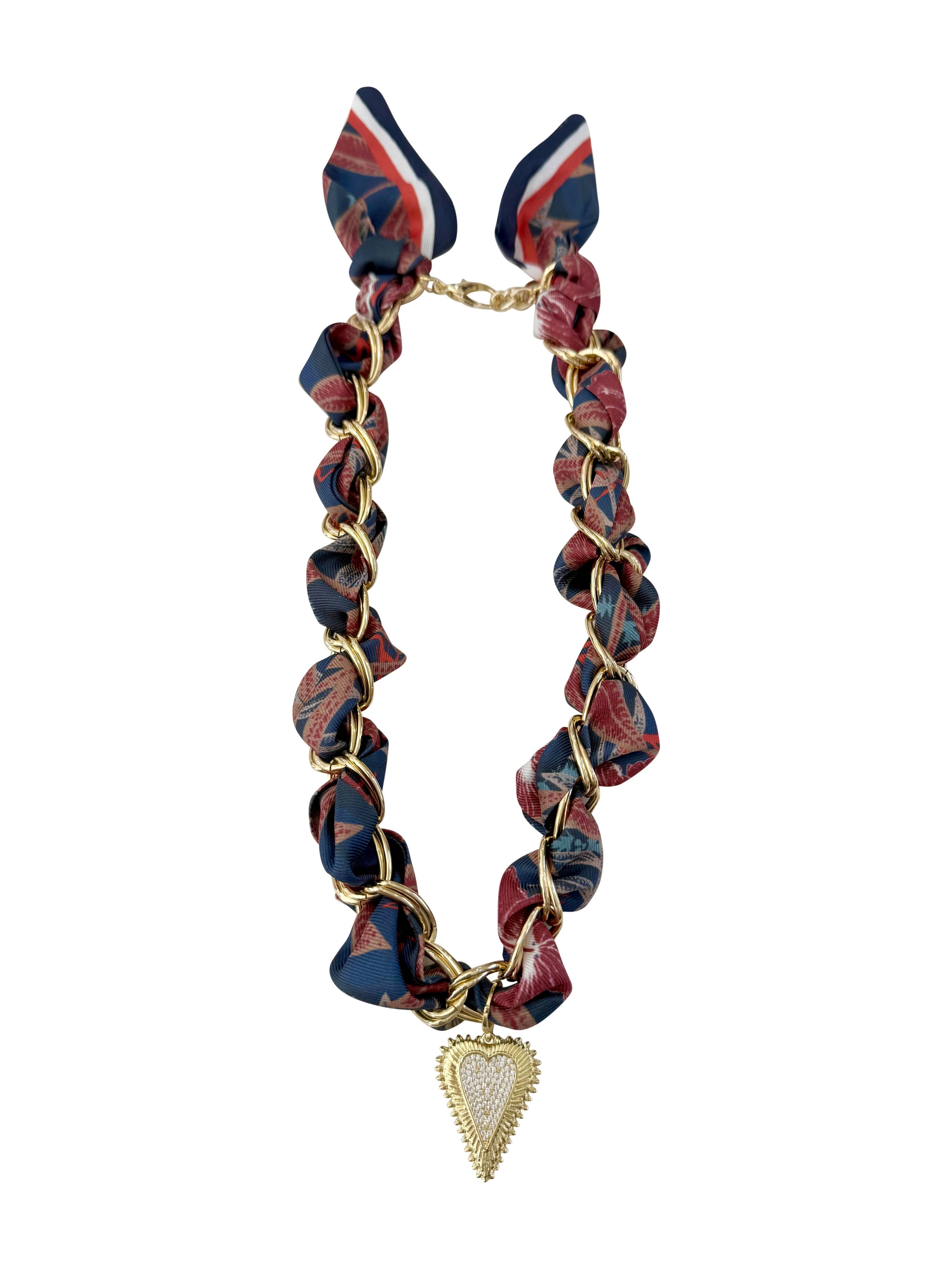 Gemelli Carson Scarf Chain Necklace featuring an 18k gold-plated chain with a silky red and blue patterned scarf, and a gold heart medallion. 