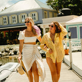 Gold and tortoise Kohv Coco oval sunglasses with classic shape and green polarized lenses