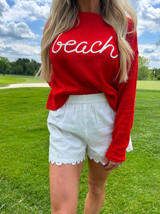 https://shearboutique.com/collections/new-arrivals/products/sienna-beach-sweater-cabana-red