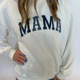 Close up of sweatshirt with "Mama" on the front