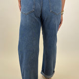 High rise Pistola Donny jeans featuring bowed wide leg silhouette and rolled cuff