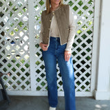 Women’s fall vest layered over a sweater for an effortless casual outfit