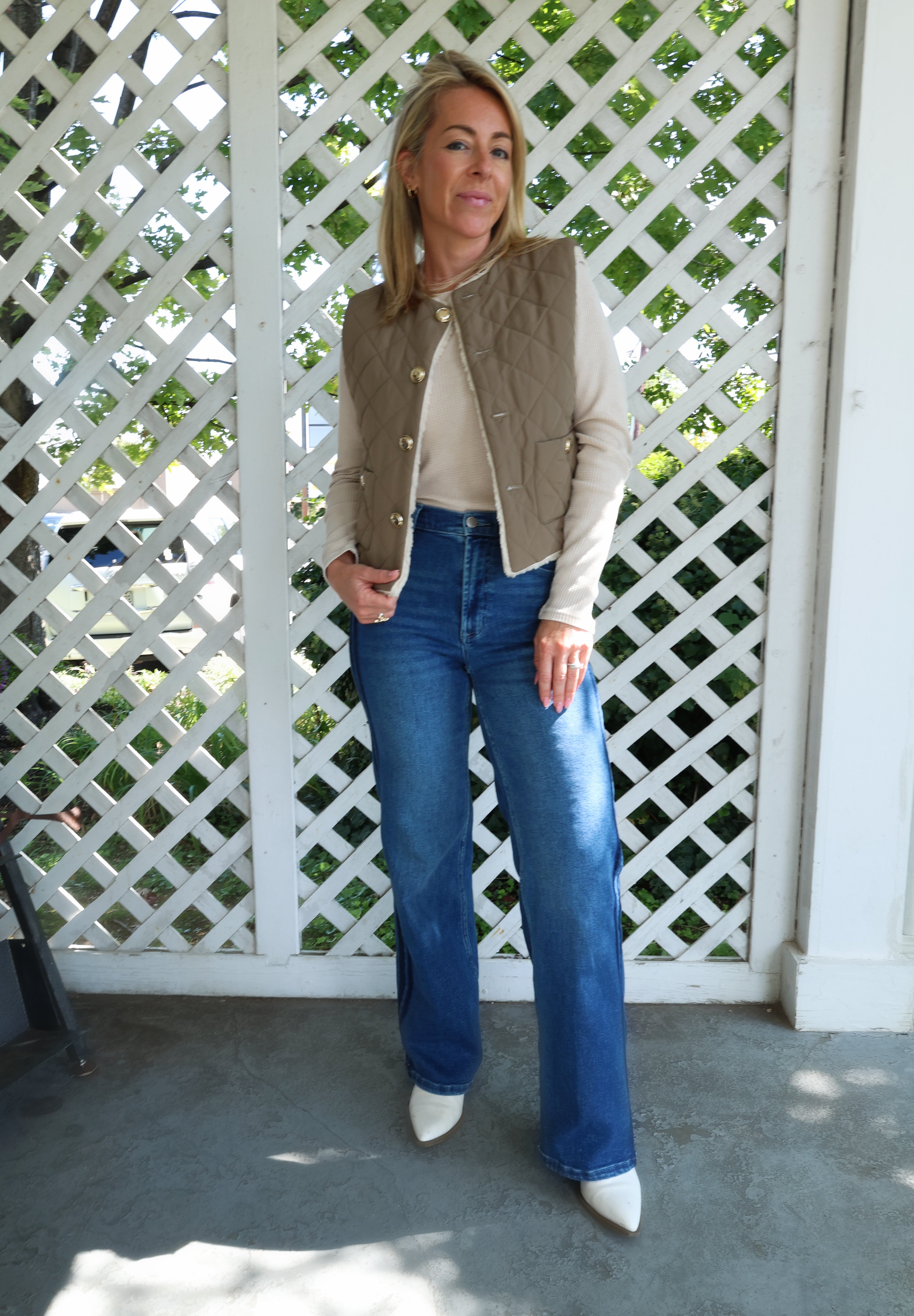 Women’s fall vest layered over a sweater for an effortless casual outfit
