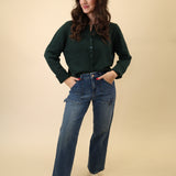 Z Supply Medina Cardigan in rich green, shown with full-length sleeves and simple front buttons.