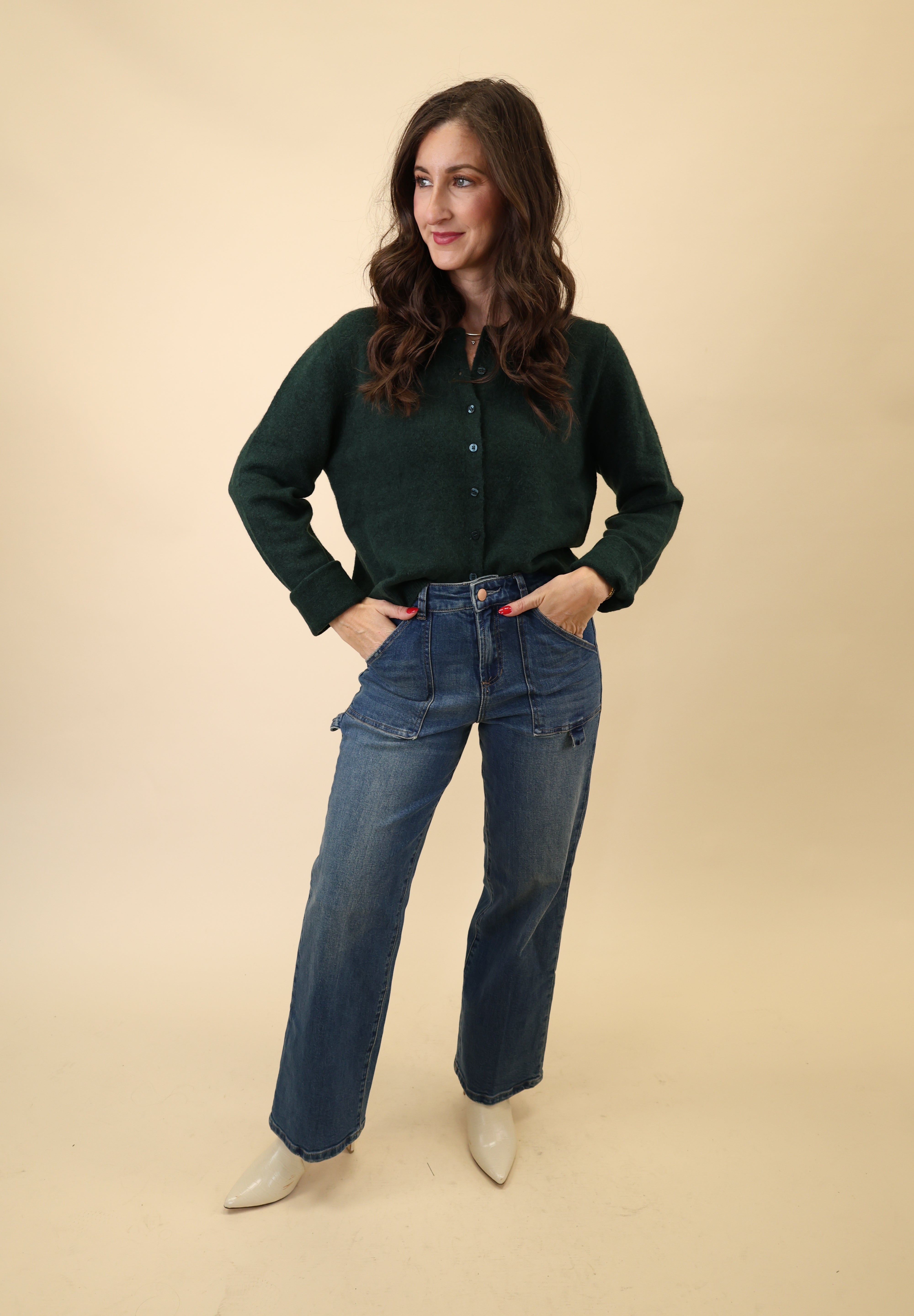 Z Supply Medina Cardigan in rich green, shown with full-length sleeves and simple front buttons.