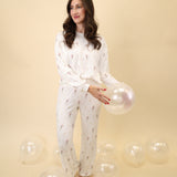 Z Supply soft crewneck long sleeve with a celebratory champagne toast print and a laid-back relaxed fit.