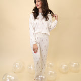 Full-length Z Supply pants with a smocked waistband, high-rise design, and soft fit-and-flare silhouette.