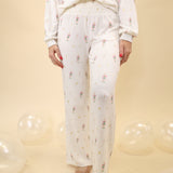 Z Supply Dawn Champs Pants with a soft feel, smocked waistband, high-rise fit, and full-length fit-and-flare silhouette.