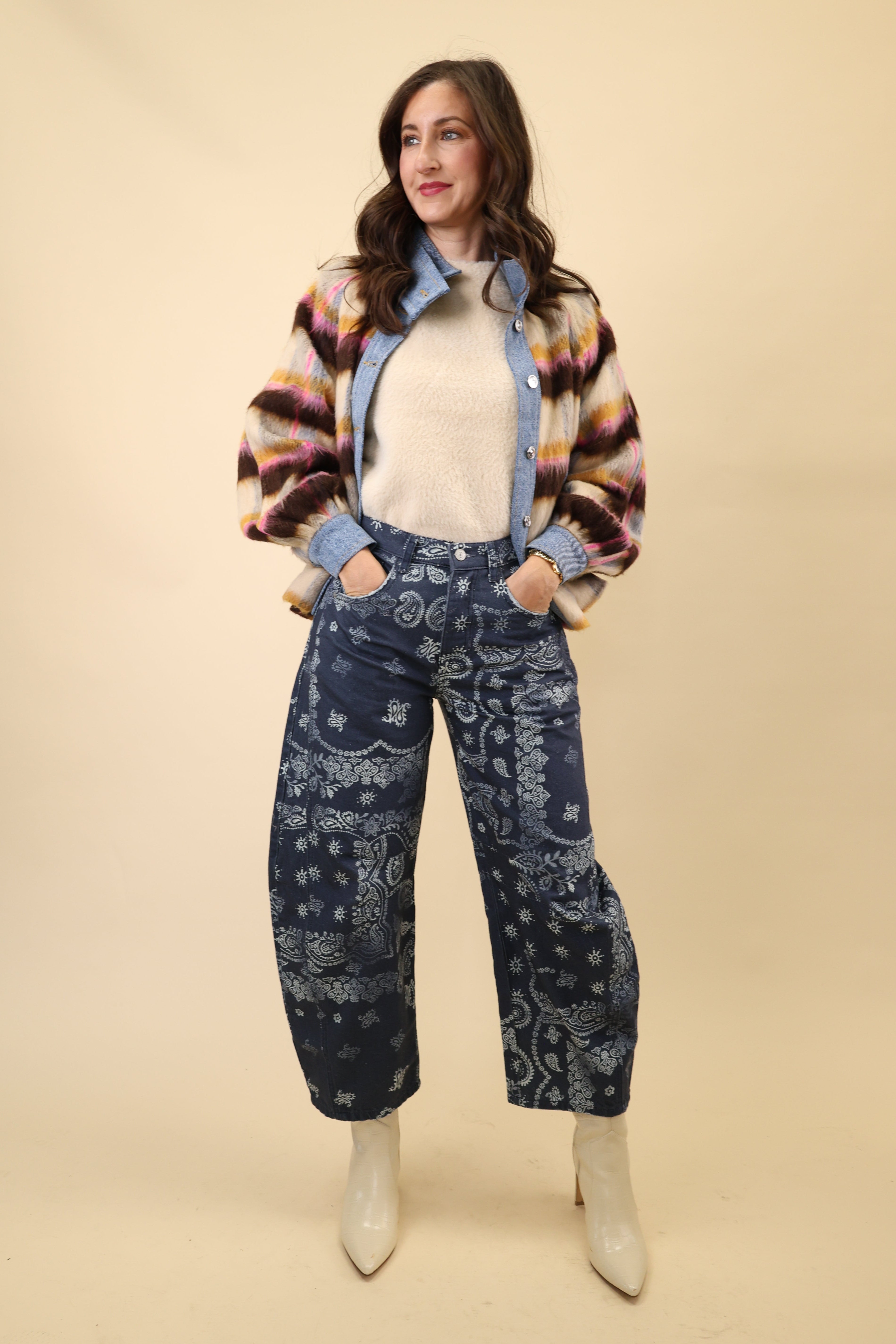Navy bandana-print barrel pants with a mid to high rise and a relaxed, curved leg shape.