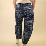Free People navy bandana Good Luck pants with a sculpted barrel leg and mid to high rise silhouette.