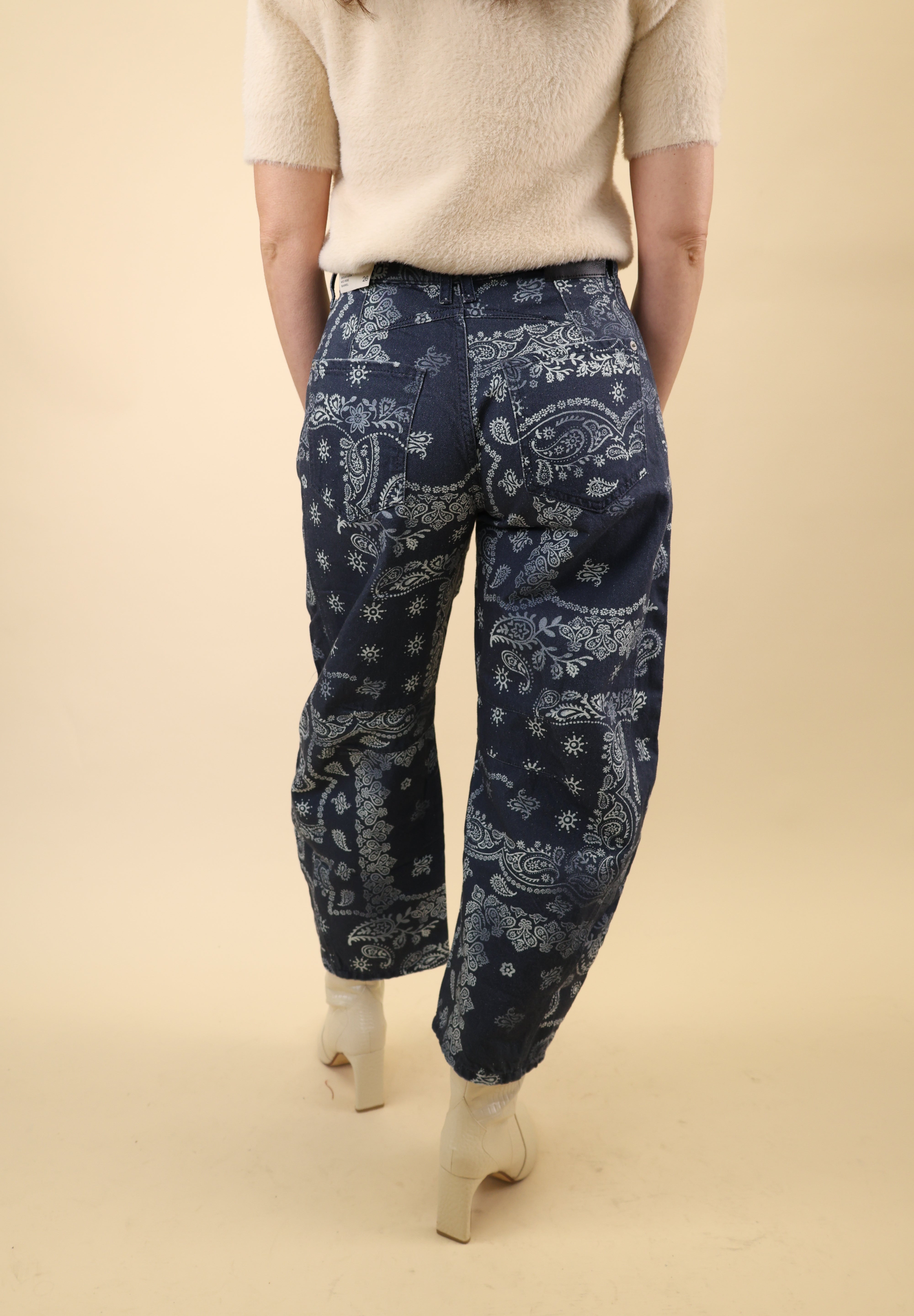 Free People navy bandana Good Luck pants with a sculpted barrel leg and mid to high rise silhouette.