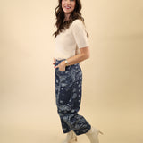 Cream knit short-sleeve sweater top featuring a lightweight, refined texture from Dear John.