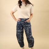 Navy bandana-print pants with a structured barrel leg and easy mid to high rise waist.