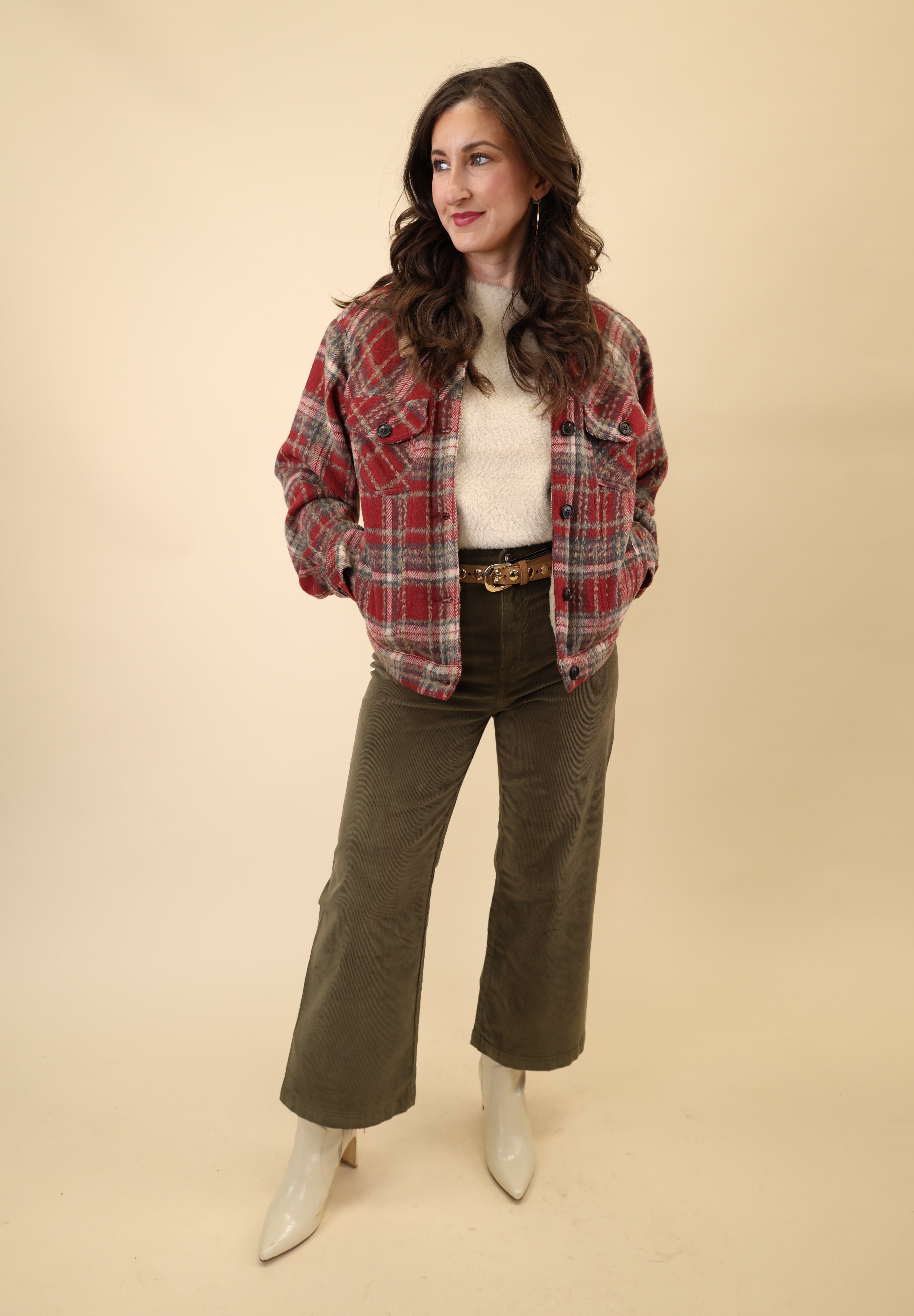 Lightweight cream sweater top featuring a soft knit construction and short-sleeve cut from Dear John.