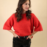 Pistola Micah red sweater with a classic crew neck, soft drape, and slightly cropped medium sleeves.