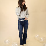 Pistola dark indigo slim boot jeans designed with a high-rise fit and clean bootcut opening for an elevated look.