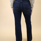 Evie Slim Boot Jeans in deep indigo wash with a flattering high-rise silhouette and classic bootcut opening.