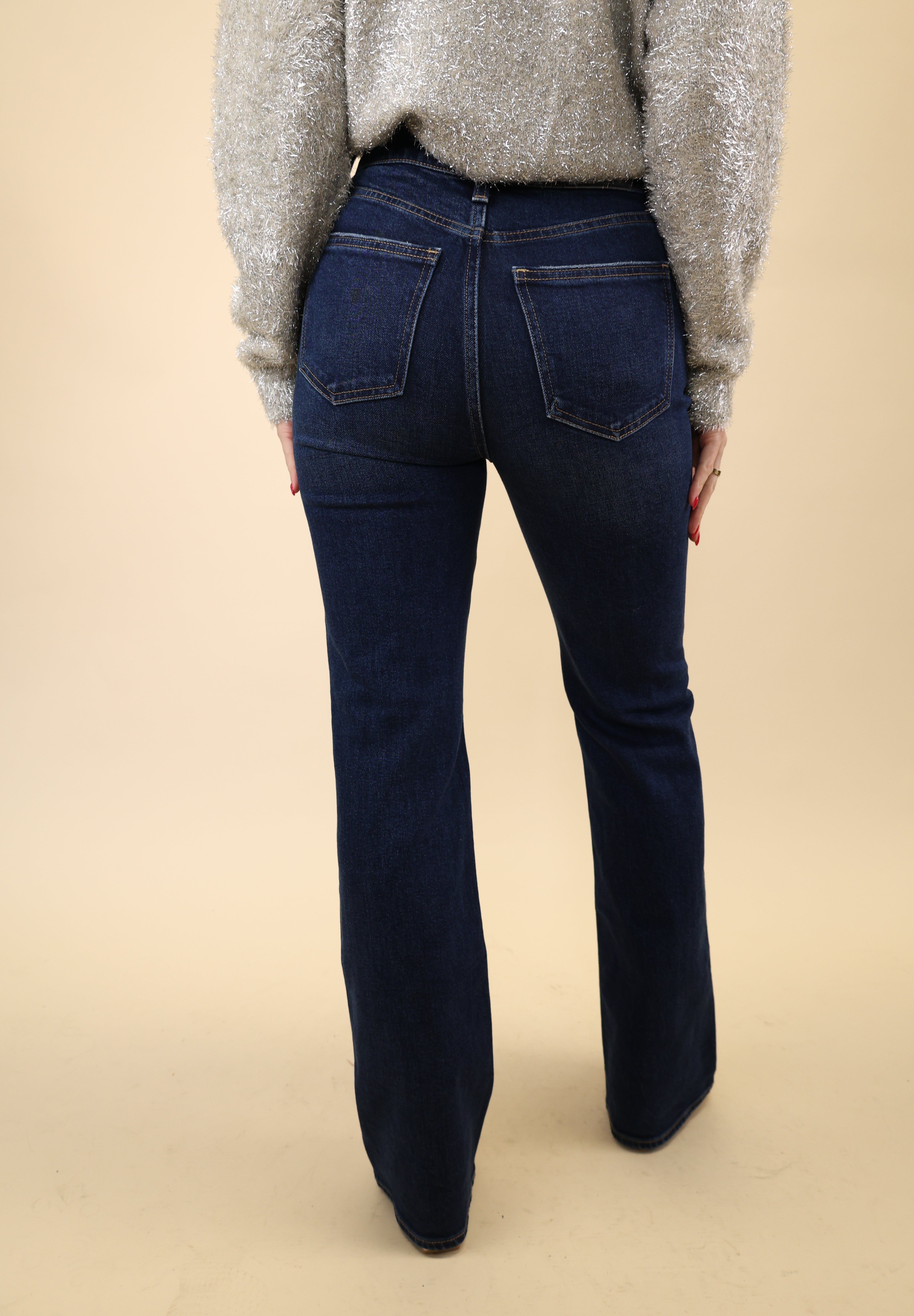 Evie Slim Boot Jeans in deep indigo wash with a flattering high-rise silhouette and classic bootcut opening.