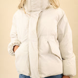 White Pistola Donovan puffer jacket made from nylon, designed with a concealed front zipper and functional pockets.
