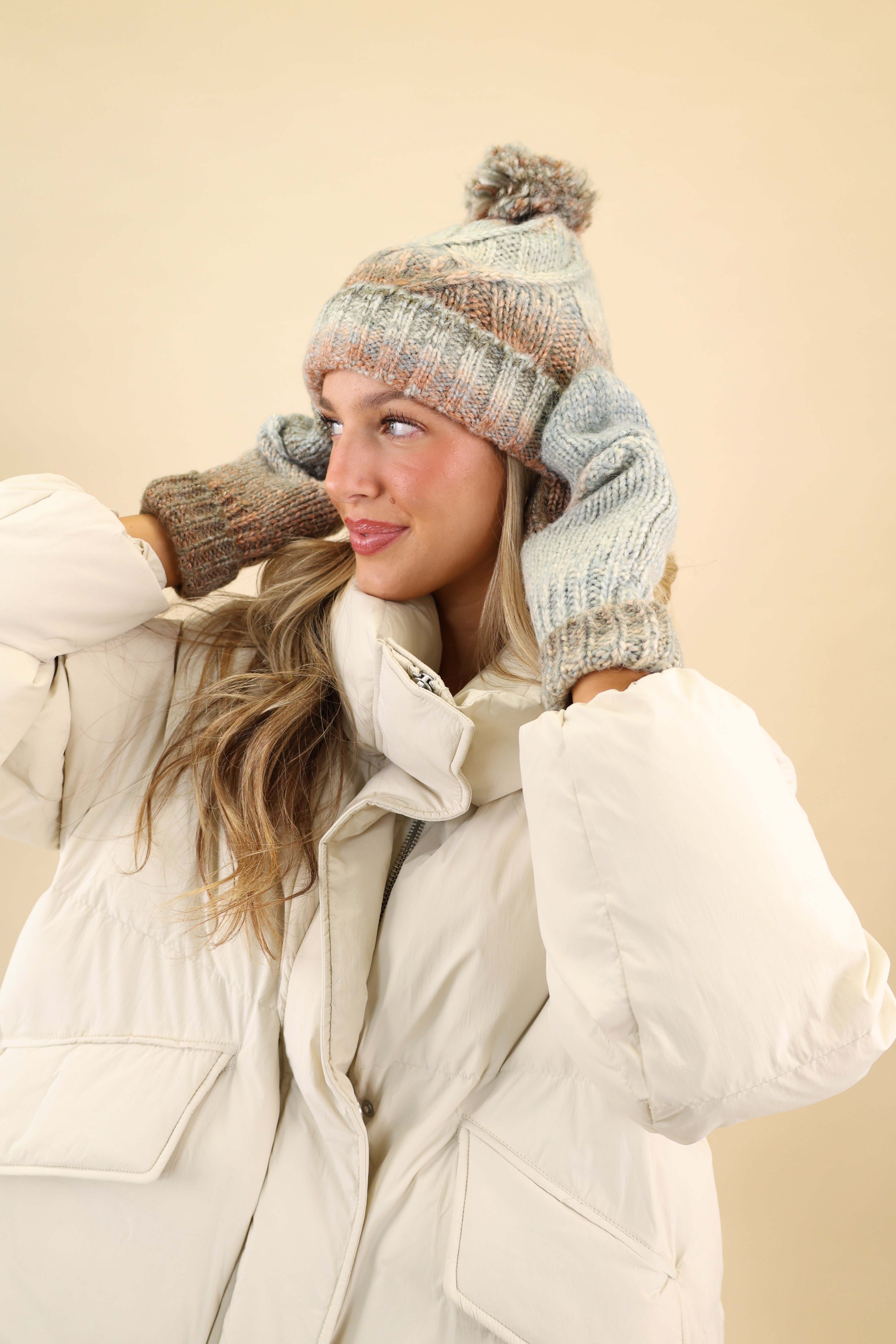 Chunky knit Free People Rainbow Run beanie with pom pom paired with coordinating convertible mitten gloves, finished with ribbed detailing.