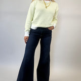 Lime and cream striped Pistola Aura sweater featuring relaxed drape and crew neckline