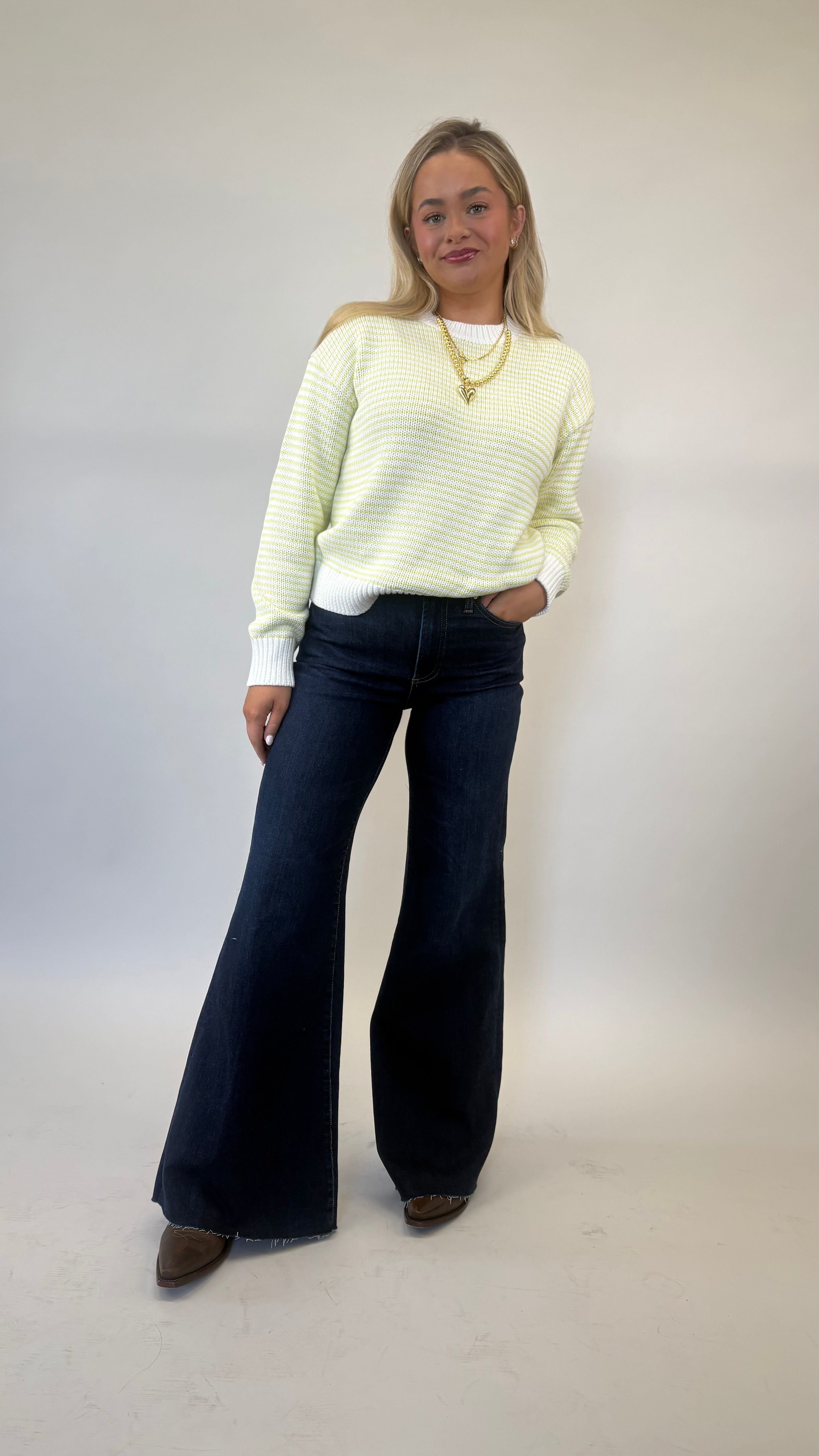 Lime and cream striped Pistola Aura sweater featuring relaxed drape and crew neckline